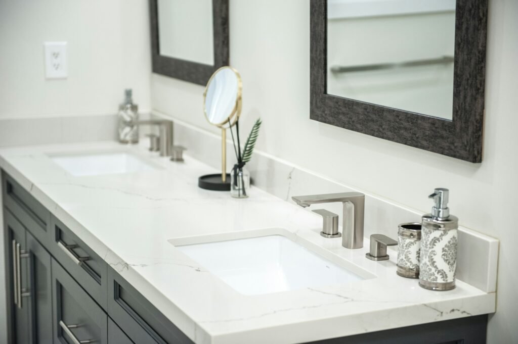 a-modern-double-vanity-bathroom-setup-featuring-sleek-quartz-countertops-and-under-mount-sinks-elegant-brushed-metal-faucets-stylish-soap-dispensers-and-framed-mirrors-provide-a-polished-and-contempor-stockpack-unsplash king of prussia